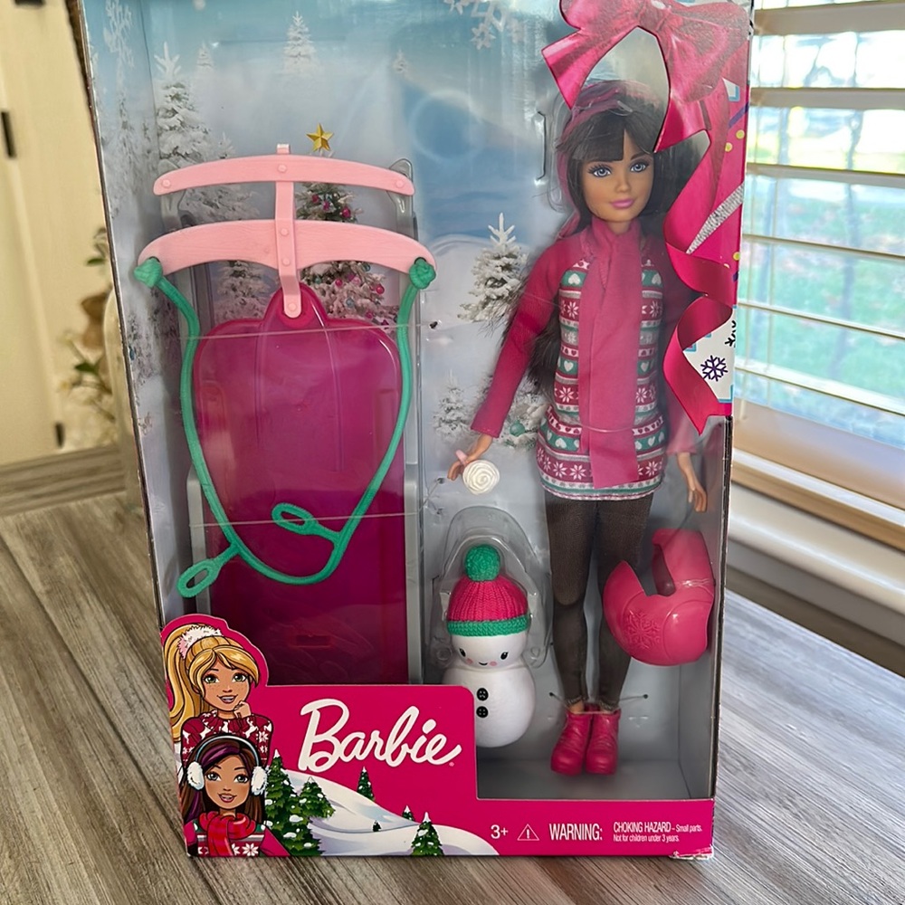 Barbie Doll with snow sled